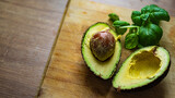 Fototapeta Pomosty - avocado on a board