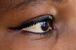 Close-up of make-up eye with long eyelashes of african american woman