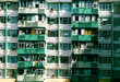Green living.  Green and white old residential tenements in Hong Kong.