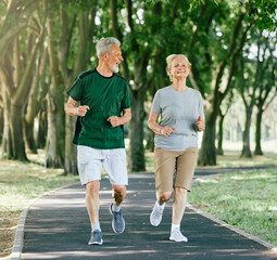 Wall Mural - outdoor senior fitness woman man lifestyle active sport exercise healthy fit runner couple running jogging elderly mature gray hair