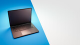 Fototapeta Do przedpokoju - Black Laptop Computer on Duotone Background with Copy Space