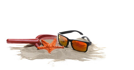 Wall Mural - Sand, toys and sunglasses isolated on white 
