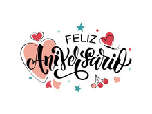 Feliz Aniversario Handwritten Phrase In Spanish (Happy Anniversary) Isolated On White Background. Hand Lettering Typography. Vector Colorful Illustration With Hearts For Greeting Card, Invitation