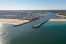 Drone Shot Of The Manasquan Inlet In New Jersey On A Bright Sunny Day