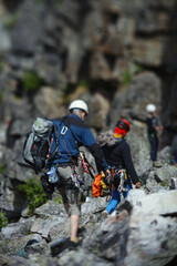 Wall Mural - Climbers figures during the competition, abstract blurred image.