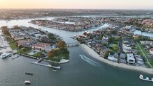 Aerial View Of The Harbor, Boats And Wealthy Coastal Neighborhood With Luxury Real Estate In Newport Beach, Orange County California.