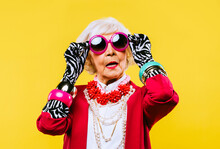 Cool And Stylish Senior Old Woman With Fashionable Clothes - Funny Colorful Portrait Of Elderly Female Lady On Colored Background