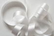 random white ribbon isolated on blank paper
