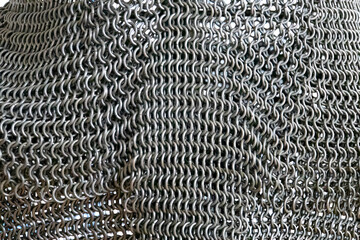 Armor Chain texture. Ring or chain steel mail background. Rows of chain mail rings as a texture.