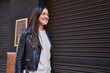 © Krakenimages.com - Young woman smiling confident standing at street