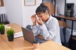 © Krakenimages.com - Young beautiful hispanic woman business worker stressed using laptop at office