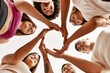 © Krakenimages.com - Group of young friends doing circle symbol with hands together