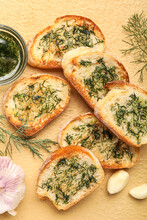 Delicious Toasts With Garlic And Dill On Color Background