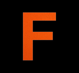 Letter F alphabet on foamy rubber background