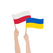 © Monika - Flagi Polski i Ukrainy w uniesionych rękach. Braterstwo i siostrzeństwo dwóch narodów. Wsparcie i współpraca Polski i Ukrainy.