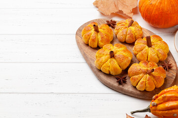 Wall Mural - Pumpkin muffins and various pumpkins