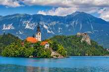 Slovenia, Upper Carniola, Church, Scenic View Of Church On Bled Island With Julian Alps In Background