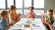 © JenkoAtaman - Teacher and joyful students celebrate   successful completion of collective school work in a bright classroom