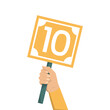 © Derariad - Hand holding scorecard with number 10. Jury showing result. Judge showing sign with a score.