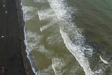 healing black sand beach in georgia. Magnetic sand on the beach in Magnetiti Batumi. High waves in the black Georgian sea in the village of Ureki