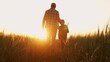 © Acronym - Farmer and his son in front of a sunset agricultural landscape. Man and a boy in a countryside field. Fatherhood, country life, farming and country lifestyle.