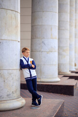  portrait of a schoolboy teenager 12 years old in stylish school clothes. back to school