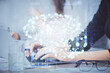 © peshkova - Multi exposure of woman hands working on computer and brain hologram drawing. Ai concept.