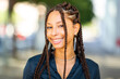© mimagephotos - Beautiful young african woman with braided hairstyle