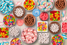 Colorful Candies, Marshmellows, Chocolate Balls In Jars, Lollipops And Sweet Peanuts
