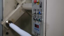 Industrial Equipment In Factory. Pressing Buttons On Old Dashboard With Up, Down, And Circled Red Buttons. Electric Control Panel In Factory With Indicator Lights. Machine Operating Console. 4 K Video
