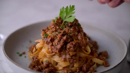 Poster - dishing up fettuccini rags pasta with Italian parsley