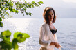 © Cavan Images - A beautiful woman poses for the camera