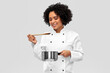 © Syda Productions - culinary and people concept - happy smiling female chef in jacket with saucepan cooking food over grey background
