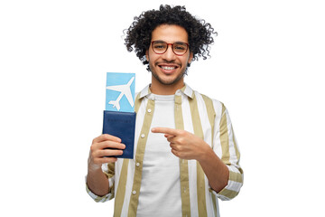 Wall Mural - travel, tourism and people concept - smiling man with passport and air ticket over white background