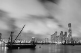 Fototapeta  - Skyline of Victoria Harbor of Hong Kong city at night