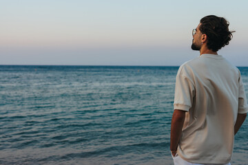 Young man looking at sea.