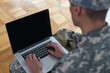 © Angelov - Soldier holding laptop. Military education concept