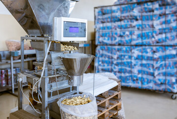 sorting and packing line of stuffed breakfast cereal pillows at factory conveyor for cereal snack production of flour products, technology production in food Industry