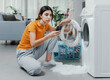 © StockPhotoPro - Broken washing machine at home