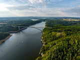 Fototapeta Natura - The Zdakov Bridge Steel Arch Bridge that spans the Vltava River,Czech Republic. Aerial View. Czechia, Europe.