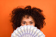Leinwandbild Motiv Photo of impressed wavy lady close face money isolated on orange color background