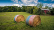 Hay bales on a meadow on a sunny summer afternoon