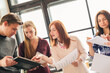 © racool_studio - Young business people working together in the modern office