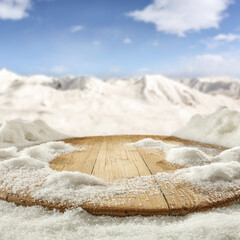 Poster - Wooden desk cover of snow and frost and winter landscape. 