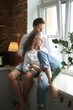 © racool_studio - Photoshoot of a young couple of woman and man in white T-shirts at home