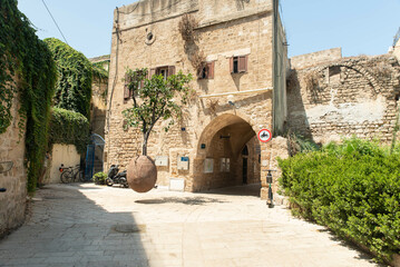 Old Jaffa Tel Aviv, Israel. City view and sight. Famous suspended orange tree. Sightseeing and tourism in Israel, Middle East.