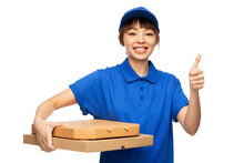 Food, Service And Job Concept - Happy Smiling Delivery Woman In Blue Uniform With Takeaway Pizza Boxes Showing Thumbs Up Gesture Over White Background