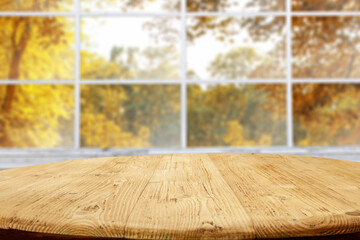 Wall Mural - Desk of free space and autumn window 