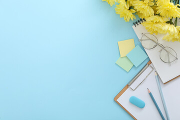 Sticker - Beautiful flowers and stationery on light blue background, flat lay with space for text. Teacher's Day