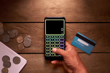 financial accounting concept, making calculations with calculator on cell phone, credit card, savings.